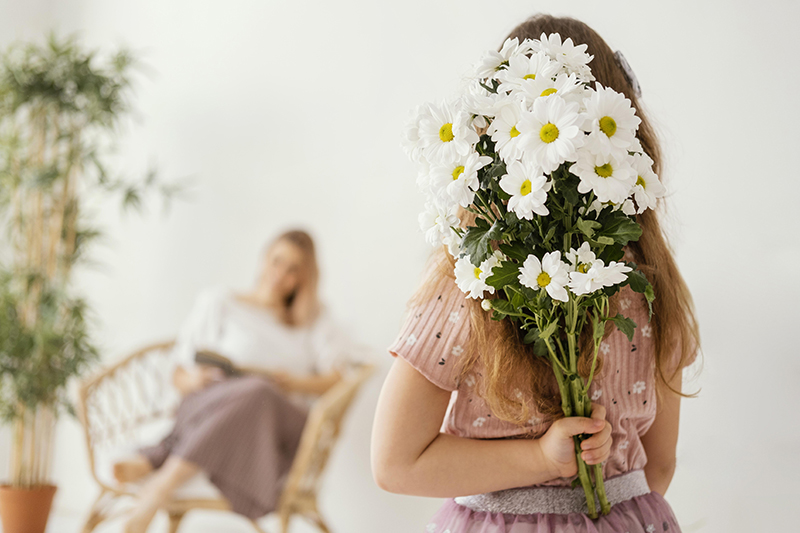 Pige med blomster